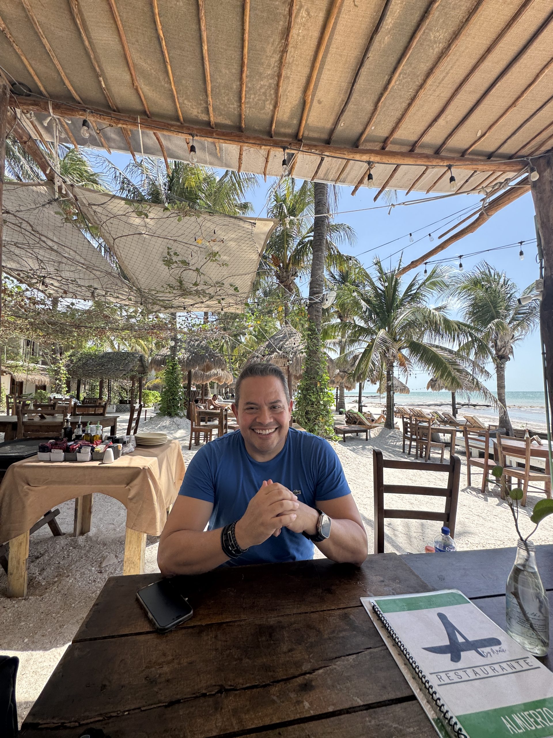 Living in Holbox Mexico — Frank Ruiz, real estate expert and CEO Coldwell Banker Riviera Maya, at a beachfront restaurant in Isla Holbox