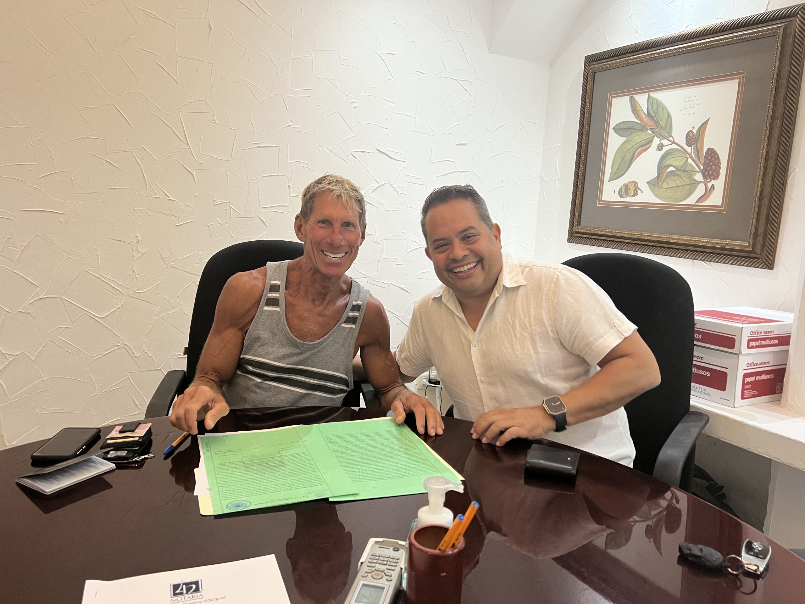 Frank Ruiz explaining the fideicomiso process for foreign buyers in Mexico to a client in the Riviera Maya